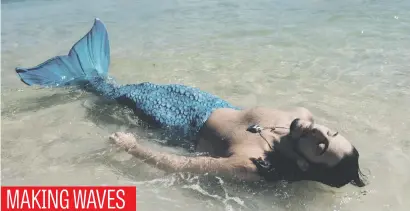  ?? Picture: AFP ?? Davi de Oliveira Moreira, known as Sereio (merman in Portuguese), wears a mermaid’s tail at Ipanema Beach in Rio de Janeiro, Brazil, recently. He is part of a growing mermaid craze in Brazil.