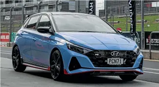  ?? NILE BIJOUX/STUFF ?? The front end of the Hyundai i20 N is really something around a racetrack. Hyundai says it should play nicely on real roads too.