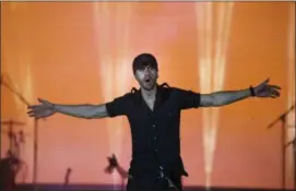  ?? ARIEL SCHALIT — THE ASSOCIATED PRESS ?? Spanish singer Enrique Iglesias performs on stage in Tel Aviv, Israel, Sunday.