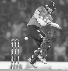  ??  ?? Eoin Morgan plays a shot during the second T20 match between India and England at the Vidarbha Cricket Associatio­n’s Jamtha stadium in Nagpur. — Reuters photo