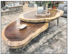  ?? Live Edge Slabs of Las Vegas ?? Most of the wood slabs are cut length-wise along the height of the tree trunk. There are also circular pieces cut across the diameter of a large trunk.