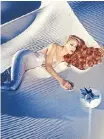  ?? ?? JERRY Hall at White Sands, New Mexico, for ‘Angel’ Campaign in Mugler’s Pearly Mermaid Couture, 1995. | Manfred Thierry Mugler