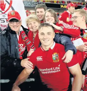  ??  ?? Lions’ player of the series Jonathan Davies with his family after the game