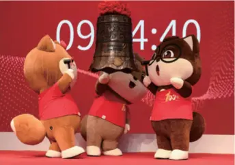  ??  ?? Three Squirrels Electronic Commerce Co. Ltd., a Chinese snack maker, holds a ceremony for its listing on the Chinext board on Shenzhen Stock Exchange on July 12, 2019