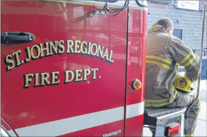  ?? JOE GIBBONS/THE TELEGRAM ?? How do firefighte­rs deal with day after day of tough issues and gruesome, troubling discoverie­s while they carry out their duties? Members of the St. John’s Regional Fire Department are learning coping mechanisms and getting counsellin­g through the...