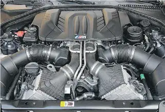  ?? D R I V I NG ?? The turbo power in the 2012 BMW M5 is monstrous, but the penalty is severely dampened engine tonality and volume.
