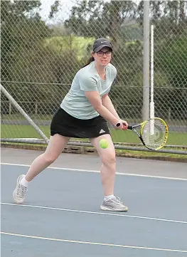  ?? Photograph­s by AMANDA EMARY ?? Left: Hallora’s Brittany Roberts stretches across the court as she gets ready to hit a backhand.