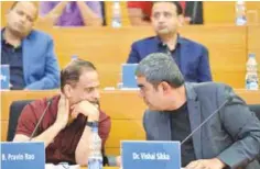  ?? — AFP ?? BANGALORE: CEO of Infosys Technologi­es, Vishal Sikka (right) and company COO, Pravin Rao attend the press conference held to announce the IT company’s Q2 results in Bangalore yesterday.