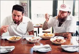  ?? Christian Abraham / Hearst Connecticu­t Media / Connecticu­t Post ?? Rosina's Restaurant owners Coby Blount and Jared Falco, right, try out several of the establishm­ent's favorite dishes in Greenwich on Aug. 26.