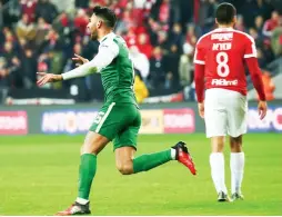  ??  ?? MACCABI HAIFA striker Eliran Atar (left) celebrates after scoring from the penalty spot in last night’s 2-0 win over Hapoel Tel Aviv and Hen Ezra.