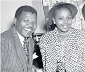  ??  ?? Nelson and Winnie Mandela on their wedding day in June 1958; and right, Mandela revisiting his prison cell in 1994