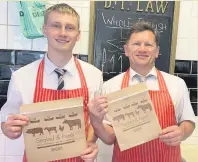  ??  ?? Butchers Greg and Darren Law with their new plastic-free packaging