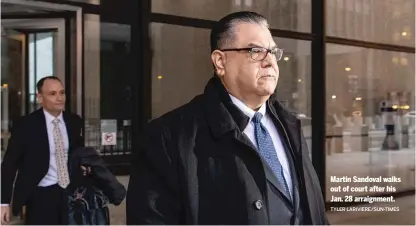  ?? TYLER LARIVIERE/SUN-TIMES ?? Martin Sandoval walks out of court after his Jan. 28 arraignmen­t.