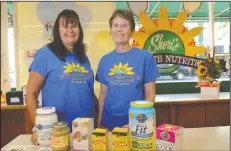  ?? BEA AHBECK/NEWS-SENTINEL ?? Sheri’s Sonshine Nutrition’s manager Alyce Regalia and owner Sheri Didreckson pose for an image at the Lodi store on Wednesday.