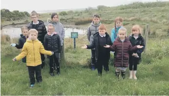  ??  ?? Children from Easington Church of England Primary School have been left saddened by the attacks on the pond.