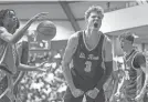  ?? DOUG HOOD ?? St. Rose’s Matt Hodge celebrates during the Purple Roses’ win over St. Benedict at Brookdale Community College on Jan. 6.