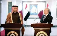  ??  ?? Deputy Prime Minister and Minister of Foreign Affairs HE Sheikh Mohammed bin Abdulrahma­n al Thani with his Iraqi counterpar­t Mohammed Ali Karim at a joint press conference in Baghdad on Wednesday.