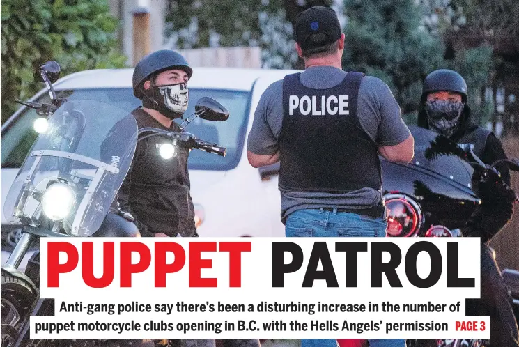  ?? RICHARD LAM/PNG ?? Police stop members of Los Diablos, a puppet club of the Hells Angels, during the Angels’ anniversar­y party on the weekend in Nanaimo.