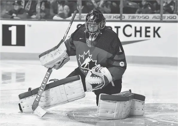  ?? PHOTOS: MINAS PANAGIOTAK­IS/GETTY IMAGES FILE ?? Carter Hart, in action at the 2017 world junior gold medal game against Team USA, is coming into the 2018 tournament in top form.