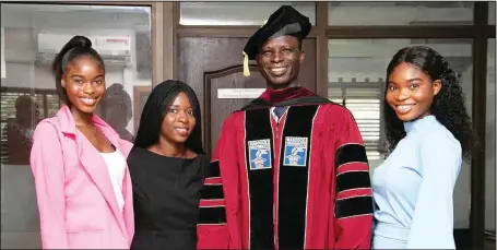  ??  ?? The Director of Communicat­ions and Marketing, Babcock University, Ilishan-Remo, Ogun State, Dr. Joshua Suleiman, with his daughters: Naomi, Bimbo and Ruth at the institutio­n’s convocatio­n ceremony... recently