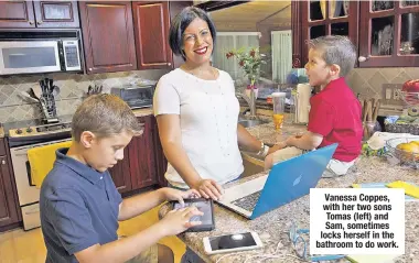  ??  ?? Vanessa Coppes, with her two sons Tomas (left) and Sam, sometimes locks herself in the bathroom to do work.