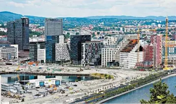  ?? RICK STEVES/RICK STEVES’ EUROPE ?? The “Barcode Project,” a collection of high-rises built on former industrial land, has reshaped Oslo’s skyline.