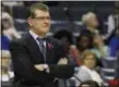  ?? KAREN PULFER FOCHT — THE ASSOCIATED PRESS ?? UConn coach Geno Auriemma watches his team during a lackluster first half of an eventual 80-34 win over Memphis on Saturday in Memphis, Tenn.