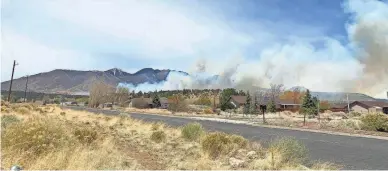  ?? INCIWEB ?? The Tunnel Fire, 14 miles northeast of Flagstaff along U.S. Highway 89, has burned more than 2,000 acres, forest officials said Tuesday.