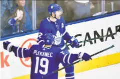  ?? Nathan Denette / Associated Press ?? Former Sharks forward Patrick Marleau celebrates one of his two goals with Toronto teammate Tomas Plekanec.