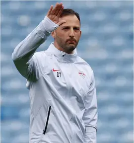  ?? ?? Domenico Tedesco waves during a training session at Ibrox