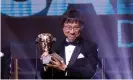  ??  ?? Nintendo’s Shinya Takahashi accepts a BAFTA award for Super Mario Odyssey in 2018. Photograph: Thomas Alexander/BAFTA/REX/Shuttersto­ck