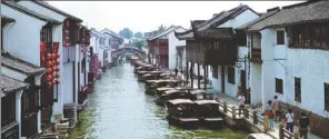  ?? PROVIDED TO CHINA DAILY ?? Canal scenes are among Suzhou’s charms. The city in Jiangsu province is also known for its classical gardens, pagodas, whitewashe­d housing, local cuisine and art.