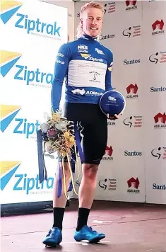  ??  ?? Cyrus Monk celebrates winning the sprinters jersey after the final stage at the Festival of Racing held in Adelaide.