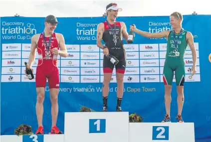  ?? Picture: Gallo Images ?? NOT DONE YET. Richard Murray (centre) is hell-bent on cementing his place among the top triathlete­s in the world after his victory in Cape Town at the weekend.