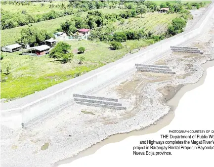  ?? PHOTOGRAPH COURTESY OF DPWH ?? THE Department of Public Works and Highways completes the Magat River Wall project in Barangay Bontal Proper in Bayombong, Nueva Ecija province.