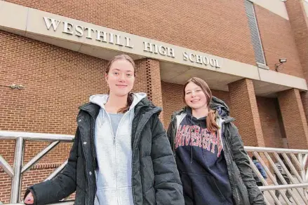  ?? Christian Abraham/Hearst Connecticu­t Media ?? Westhill High School students Jackie Brzoska, left, and Lilly Lapine at the school in Stamford on Feb. 1. Brzoska and Lapine had lined up internship­s for their senior year.