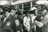  ??  ?? Bused black students in Boston in 1974