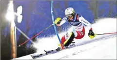  ?? FABRICE COFFRINI/AFP ?? Switzerlan­d’s Wendy Holdener competes in the Women’s Combined Slalom event of the 2019 FIS Alpine Ski World Championsh­ips at the National Arena in Are, Sweden on Tuesday.