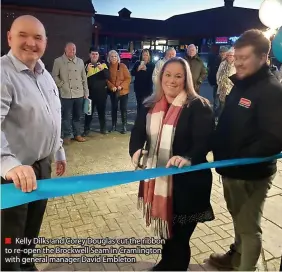  ?? ?? ■ Kelly Dilks and Corey Douglas cut the ribbon to re-open the Brockwell Seam in Cramlingto­n with general manager David Embleton