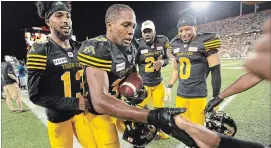  ?? PETER POWER THE CANADIAN PRESS ?? Frankie Williams (37) celebrates his kick return touchdown against the Toronto Argonauts in the Ticat’s first preason game June 1.