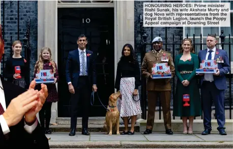  ?? ?? HONOURIN HEROES: Prim minister Rish Sunak, is Akshat Murt an
Nova it repr entatives from he Royal Britis Legion, launch the Poppy Appeal ampaig at owning tree