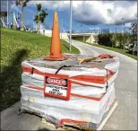  ?? LANNIS WATERS / THE PALM BEACH POST ?? A pallet of pavers awaits installati­on at the Ballpark of the Palm
Beaches last week. Problems with
the project have created
tension among teams, the general contractor and the subcontrac­tors.