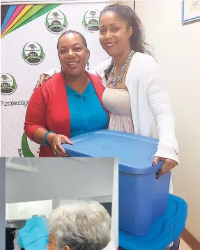  ?? CONTRIBUTE­D ?? Karen Sankar (right) manager at SoHo Boutique, presents Rosalee Gage-Grey, head of the Child Protection and Family Services Agency (CPFSA) with clothing for female wards of the State, following last year’s Christmas Closet.