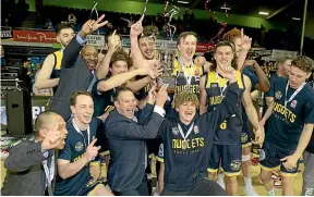  ?? GETTY IMAGES/ STUFF ?? The Otago Nuggets took out the NBL Showdown in August, a competitio­n which has league general manager Justin Nelson, left, excited about the code’s future.