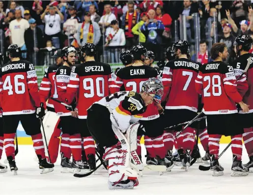  ?? Martin
Rose / Gett
y Images ?? It was a long day for German goalie Danny Aus den Birken at the world hockey championsh­ip in Prague, Czech Republic. Aus den Birken stopped just 15 of 19 shots Canada fired at him in a 10-0 loss. Starter Dennis Endras had even less success,
getting...
