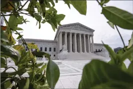  ?? J. SCOTT APPLEWHITE — THE ASSOCIATED PRESS ?? The Supreme Court is seen in Washington on June 15.