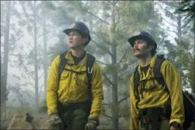  ?? RICHARD FOREMAN JR./SONY PICTURES VIA AP ?? This image released by Sony Pictures shows Miles Teller, left, and Taylor Kitsch in a scene from “Only the Brave.”