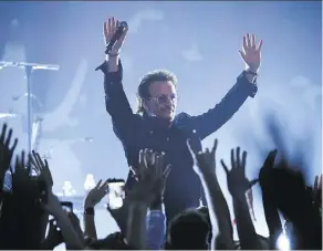  ?? ASSOCIATED PRESS EVAN AGOSTINI/THE ?? Singer Bono of U2 performs at the Apollo Theater on Monday.