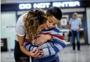  ?? RYAN CHRISTOPHE­R JONES / THE NEW YORK TIMES ?? Dozens of children have now experience­d what 7-year-old Kevin did on June 29 when he was reunited with his mom Brenda Garcia at Washington Dulles airport in Dulles, Va.