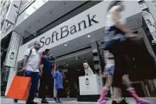  ?? Bloomberg ?? A SoftBank store in Tokyo. In 2013, Softbank bought an 80 per cent stake in American mobile network Sprint.